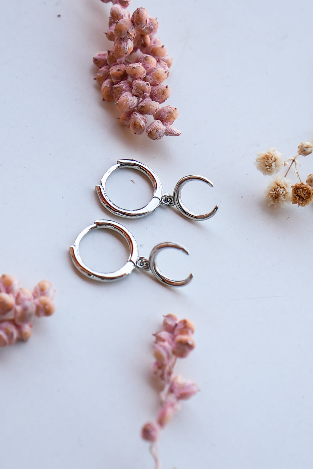 Pendientes luna creciente plata